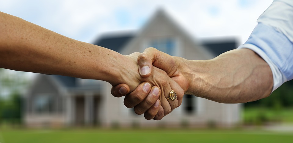 agent working with buyer for new home construction in salt lake